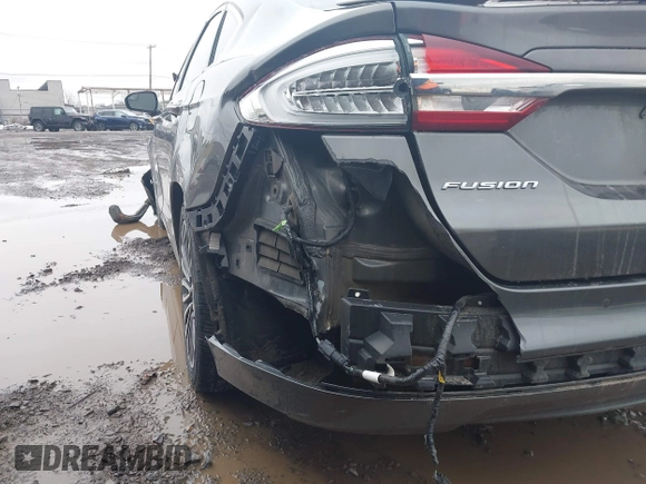 2017 Ford Fusion Hybrid Titanium z VIN 3FA6P0RU6HR279726, wystawiony jako IAAI lot #41736889 z przebiegiem 123 698 mil mil oraz . Historia ofert i sprzedaży dostępna na DreamBid. Obrazek 6.