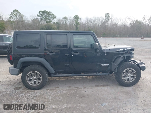 2017 Jeep Wrangler Unlimited Rubicon with VIN 1C4BJWFG4HL679150, listed as a IAAI auction lot 41720239 with 81,142 mi miles and . Bid and sale history available at DreamBid. Image 14.