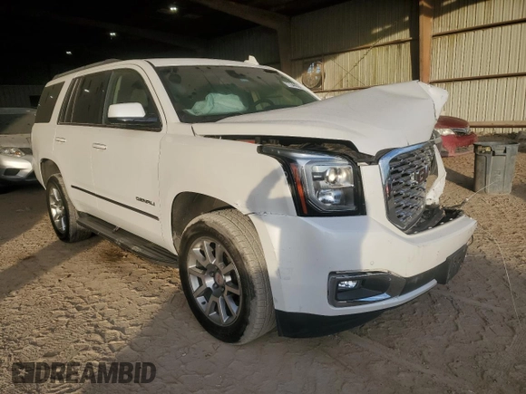 2019 GMC Yukon Denali with VIN 1GKS1CKJ7KR370524, listed as a Copart auction lot 77344394 with 39,753 mi miles and Salvage Title. Bid and sale history available at carsss.com. Image 4.
