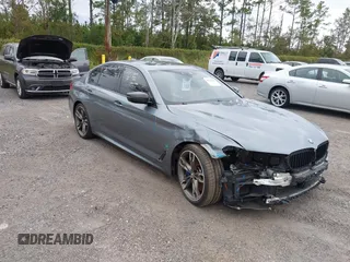 2019 BMW 5 Series M550i xDrive with VIN WBAJB9C57KB289439, listed as a IAAI auction lot 40634389 with 85,992 mi miles and . Bid and sale history available at DreamBid. Image 1.