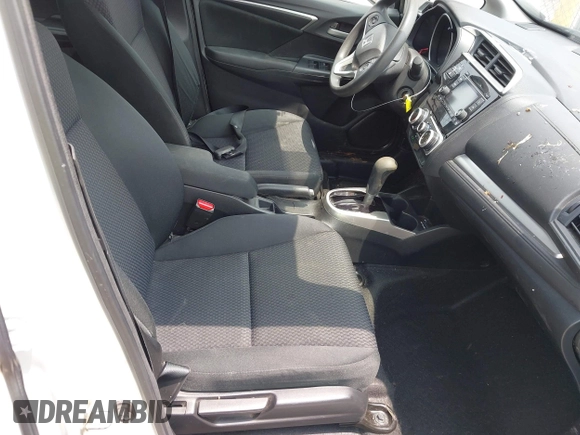 2019 Honda Fit LX with VIN 3HGGK5H41KM728618, listed as a IAAI auction lot 42457662 with 83,851 mi miles and . Bid and sale history available at DreamBid. Image 5.