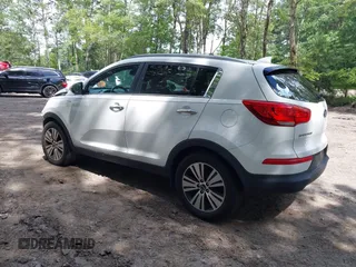 2014 Kia Sportage EX with VIN KNDPCCAC5E7658993, listed as a IAAI auction lot 42679549 with 107,658 mi miles and . Bid and sale history available at DreamBid. Image 3.