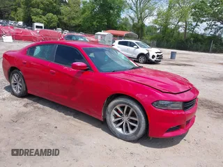 2015 Dodge Charger SXT z VIN 2C3CDXHG5FH857662, wystawiony jako IAAI lot #42155094 z przebiegiem 121 172 mil mil oraz . Historia ofert i sprzedaży dostępna na DreamBid. Obrazek 1.