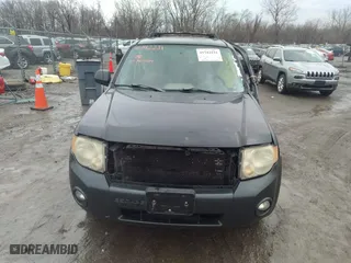 2008 Ford Escape XLT with VIN 1FMCU03148KC05614, listed as a IAAI auction lot 41742231 with 264,599 mi miles. Bid and sale history available at carsss.com. Image 12.