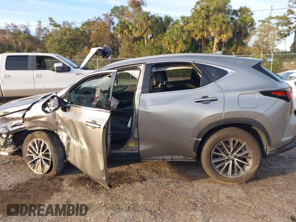 2023 Lexus NX with VIN 2T2GGCEZ0PC026760, listed as a IAAI auction lot 41242637 with 25,300 mi miles. Bid and sale history available at carsss.com. Image 14.