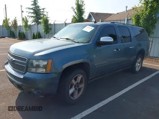 2008 Chevrolet Suburban LTZ z VIN 3GNFK16338G159718, wystawiony jako IAAI lot #42570638 z przebiegiem 219 213 mil mil oraz . Historia ofert i sprzedaży dostępna na DreamBid. Obrazek 2.