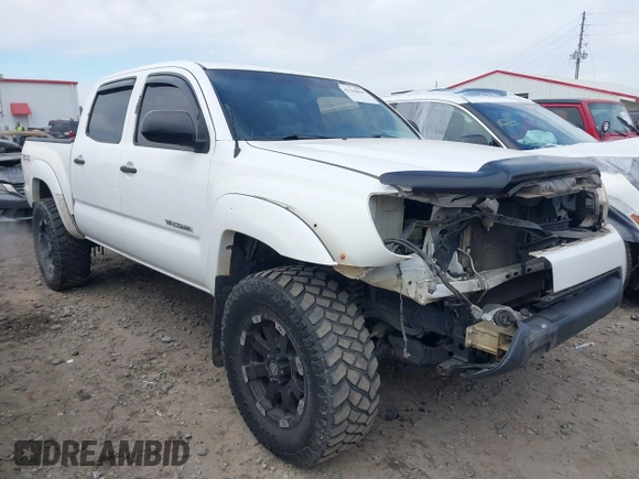 2013 Toyota Tacoma z VIN 5TFLU4EN2DX076815, wystawiony jako IAAI lot #41344839 z przebiegiem 311 083 mil mil oraz . Historia ofert i sprzedaży dostępna na DreamBid. Obrazek 1.