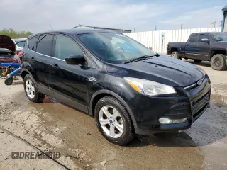 2016 Ford Escape SE z VIN 1FMCU0G99GUA13835, wystawiony jako Copart lot #52401865 z przebiegiem 130 143 mil mil oraz Szkoda całkowita • Salvage title. Historia ofert i sprzedaży dostępna na DreamBid. Obrazek 4.