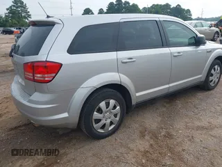 2014 Dodge Journey American Value with VIN 3C4PDCAB5ET198704, listed as a IAAI auction lot 42368950 with 220,615 mi miles and . Bid and sale history available at DreamBid. Image 4.