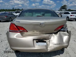 2006 Toyota Avalon XL z VIN 4T1BK36BX6U148201, wystawiony jako Copart lot #56373605 z przebiegiem 263 466 mil mil oraz Szkoda całkowita • Salvage title. Historia ofert i sprzedaży dostępna na DreamBid. Obrazek 6.