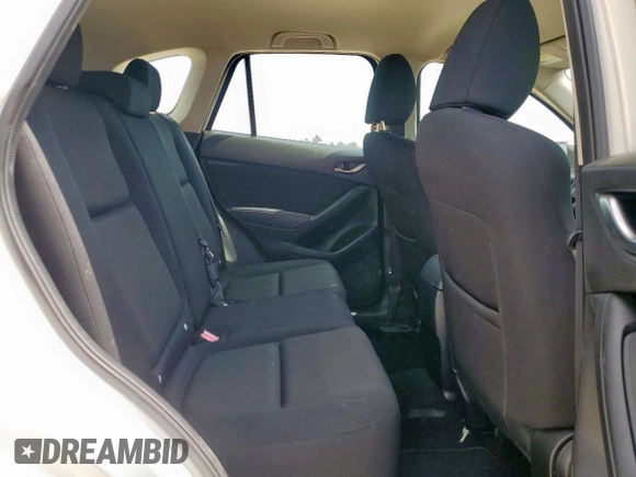 2016 Mazda CX-5 Sport with VIN JM3KE4BY0G0742436, listed as a Copart auction lot 59693945 with 74,314 mi miles and Salvage title. Bid and sale history available at DreamBid. Image 11.