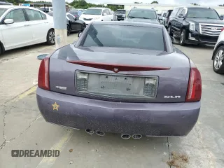2004 Cadillac XLR z VIN 1G6YV34AX45600514, wystawiony jako Copart lot #74852854 z przebiegiem 37 941 mil mil oraz Nie do naprawy. Historia ofert i sprzedaży dostępna na DreamBid. Obrazek 6.