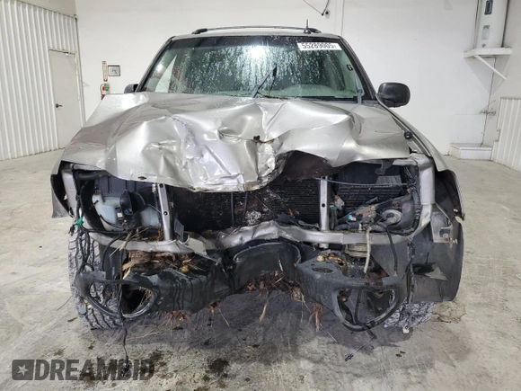 2005 GMC Envoy SLE с VIN 1GKDS13S752274178, выставлен на аукционе Copart как лот 55289005 с пробегом 199 378 миль миль и Списание • Salvage title. История ставок и продаж доступна на DreamBid. Изображение 5.