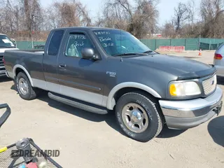 2003 Ford F-150 XL with VIN 1FTRX17L33NB61748, listed as a IAAI auction lot 41789730 with 301,092 mi miles. Bid and sale history available at carsss.com. Image 1.