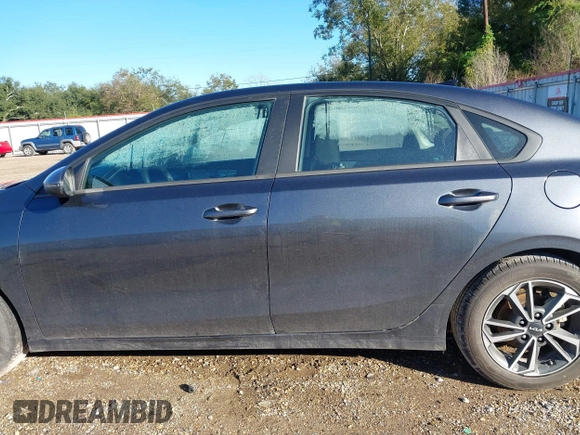 2023 Kia Forte LXS with VIN 3KPF24ADXPE607392, listed as a IAAI auction lot 40892259 with 35,581 mi miles and . Bid and sale history available at DreamBid. Image 14.