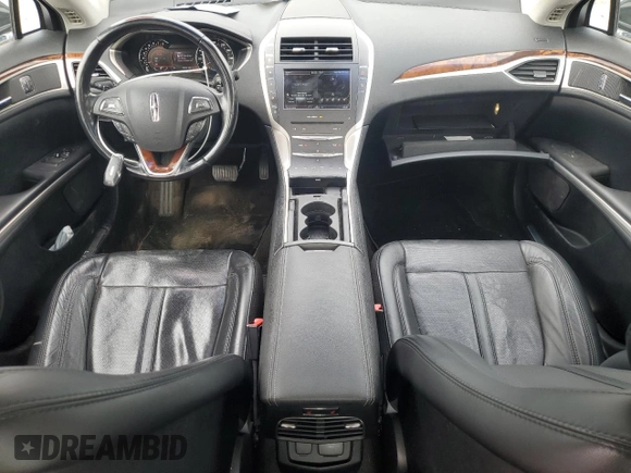 2015 Lincoln MKZ с VIN 3LN6L2JK6FR616660, выставлен на аукционе Copart как лот 66220555 с пробегом 47 377 миль миль и Списание • Salvage title. История ставок и продаж доступна на DreamBid. Изображение 8.
