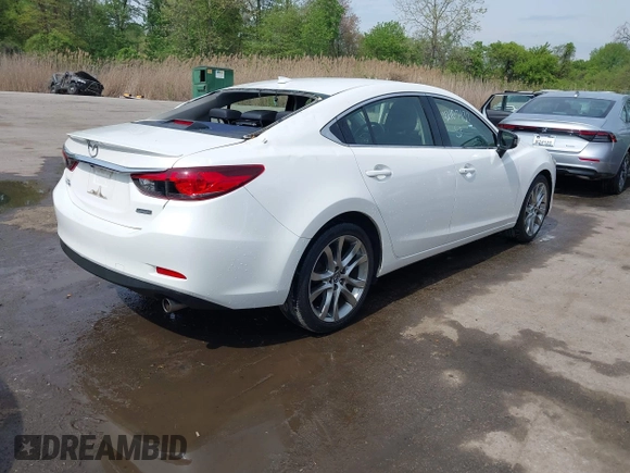 2014 Mazda 6 i Grand Touring with VIN JM1GJ1W5XE1107644, listed as a IAAI auction lot 42107937 with 78,998 mi miles. Bid and sale history available at carsss.com. Image 4.