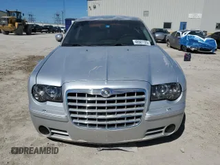 2006 Chrysler 300 C SRT8 with VIN 2C3KA73W76H101950, listed as a Copart auction lot 48501125 with 144,696 mi miles and Salvage Title. Bid and sale history available at carsss.com. Image 5.