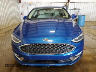 2017 Ford Fusion Titanium z VIN 3FA6P0D99HR162354, wystawiony jako Copart lot #61753395 z przebiegiem 100 678 mil mil oraz Szkoda całkowita • Salvage title. Historia ofert i sprzedaży dostępna na DreamBid. Obrazek 5.