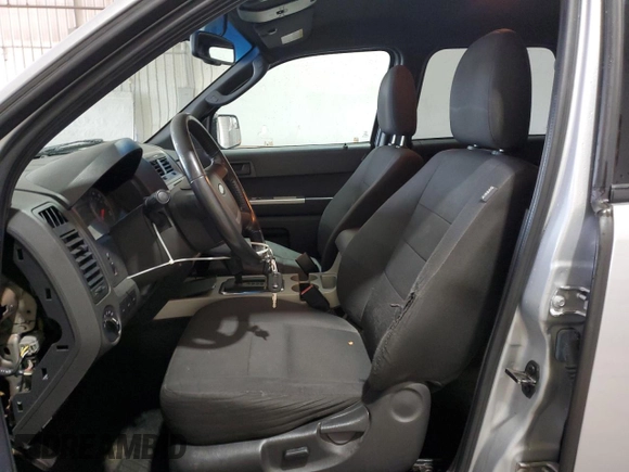 2012 Ford Escape XLT with VIN 1FMCU9D75CKC35544, listed as a Copart auction lot 65014435 with 135,740 mi miles and Salvage title. Bid and sale history available at DreamBid. Image 7.
