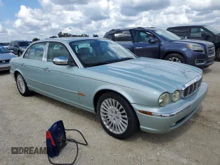 2005 Jaguar XJ VDP with VIN SAJWA82C35SG38532, listed as a Copart auction lot 74119114 with 113,507 mi miles and Salvage Title. Bid and sale history available at carsss.com. Image 4.