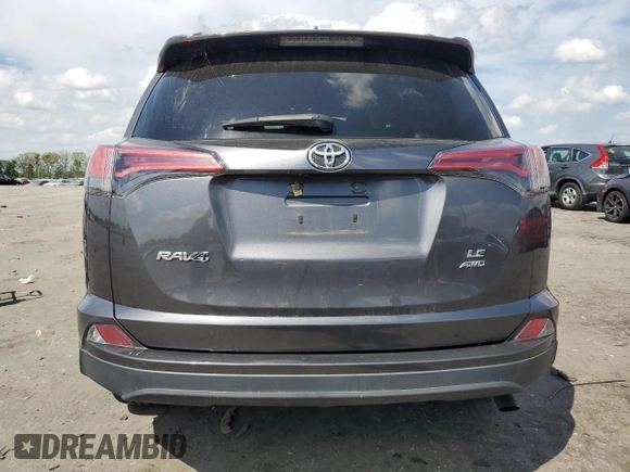 2018 Toyota RAV4 LE with VIN 2T3BFREV1JW757258, listed as a Copart auction lot 52914565 with 61,237 mi miles and Salvage Title. Bid and sale history available at carsss.com. Image 6.