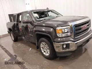 2015 GMC Sierra 1500 SLE with VIN 1GTV2UEC0FZ151760, listed as a IAAI auction lot 41988450 with 124,674 mi miles. Bid and sale history available at carsss.com. Image 1.