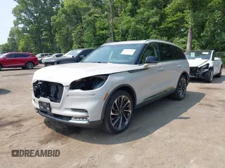 2020 Lincoln Aviator Reserve with VIN 5LM5J7XC8LGL00255, listed as a IAAI auction lot 42413528 with 24,480 mi miles and . Bid and sale history available at DreamBid. Image 2.