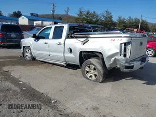 2015 Chevrolet Silverado 1500 LT with VIN 1GCVKREC0FZ191446, listed as a IAAI auction lot 41677362 with 62,567 mi miles. Bid and sale history available at carsss.com. Image 3.