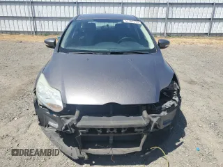 2014 Ford Focus SE z VIN 1FADP3K24EL317353, wystawiony jako Copart lot #57181215 z przebiegiem 144 495 mil mil oraz Szkoda całkowita • Salvage title. Historia ofert i sprzedaży dostępna na DreamBid. Obrazek 5.