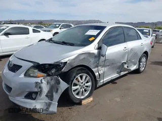 2010 Toyota Corolla with VIN 1NXBU4EE4AZ292041, listed as a IAAI auction lot 41925151 with 213,384 mi miles. Bid and sale history available at carsss.com. Image 2.