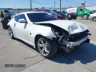 2009 Nissan 370Z Touring with VIN JN1AZ44E99M411252, listed as a IAAI auction lot 41969671 with 91,873 mi miles and . Bid and sale history available at DreamBid. Image 1.