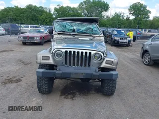 2004 Jeep Wrangler Sahara with VIN 1J4FA59S54P740417, listed as a IAAI auction lot 42382078 with 200,108 mi miles and . Bid and sale history available at DreamBid. Image 13.