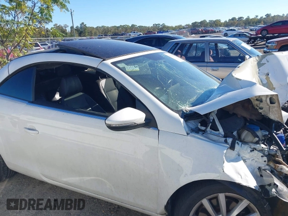 2012 Volkswagen Eos Komfort with VIN WVWBW7AH9CV017620, listed as a IAAI auction lot 40945479 with 96,444 mi miles and . Bid and sale history available at DreamBid. Image 13.