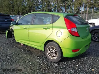 2012 Hyundai Accent GS with VIN KMHCT5AE9CU021238, listed as a IAAI auction lot 41762650 with 166,287 mi miles. Bid and sale history available at carsss.com. Image 3.