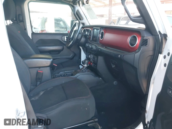 2020 Jeep Wrangler Unlimited Rubicon with VIN 1C4HJXFGXLW107958, listed as a IAAI auction lot 42058477 with 69,951 mi miles and . Bid and sale history available at DreamBid. Image 5.