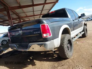 2014 Ram 2500 Laramie with VIN 3C6UR5FL6EG152493, listed as a IAAI auction lot 41342914 with 122,212 mi miles. Bid and sale history available at carsss.com. Image 4.
