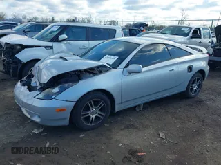 2002 Toyota Celica GT with VIN JTDDR32T120140349, listed as a IAAI auction lot 42037609 with 165,177 mi miles. Bid and sale history available at carsss.com. Image 2.