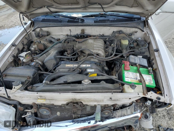 1997 Toyota 4Runner SR5 z VIN JT3HN86R2V0085668, wystawiony jako Copart lot #56460025 z przebiegiem 127 352 mil mil oraz Szkoda całkowita • Salvage title. Historia ofert i sprzedaży dostępna na DreamBid. Obrazek 12.