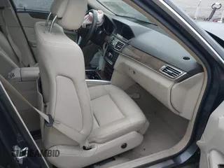 2014 Mercedes-Benz E 350 Sport with VIN WDDHF5KB7EA779952, listed as a IAAI auction lot 42308290 with 100,000 mi miles and . Bid and sale history available at DreamBid. Image 5.
