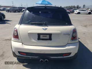 2009 MINI Hardtop S with VIN WMWMF73569TW80561, listed as a Copart auction lot 52615805 with 109,968 mi miles and Salvage title. Bid and sale history available at DreamBid. Image 6.