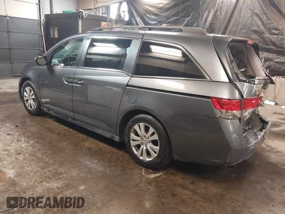 2016 Honda Odyssey EX-L with VIN 5FNRL5H61GB138100, listed as a IAAI auction lot 41548666 with 127,780 mi miles. Bid and sale history available at carsss.com. Image 3.