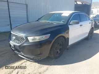 2014 Ford Police Interceptor with VIN 1FAHP2MK4EG124301, listed as a IAAI auction lot 41596193 with 101,314 mi miles and . Bid and sale history available at DreamBid. Image 2.