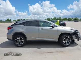 2018 Lexus RX 350 z VIN 2T2ZZMCAXJC110162, wystawiony jako IAAI lot #42608568 z przebiegiem 70 231 mil mil oraz . Historia ofert i sprzedaży dostępna na DreamBid. Obrazek 13.