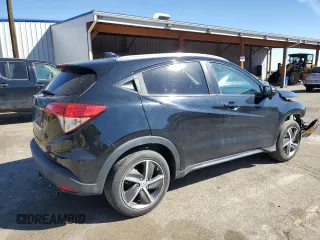 2021 Honda HR-V EX-L with VIN 3CZRU5H74MM719808, listed as a Copart auction lot 50609565 with 52,031 mi miles and Salvage Title. Bid and sale history available at carsss.com. Image 3.