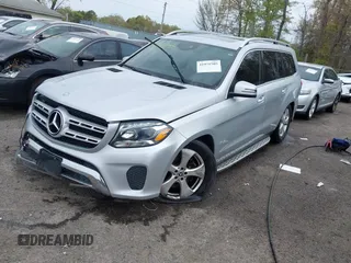 2017 Mercedes-Benz GLS 450 with VIN 4JGDF6EE9HA787099, listed as a IAAI auction lot 41971505 with 80,159 mi miles and . Bid and sale history available at DreamBid. Image 2.