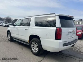 2016 Chevrolet Suburban LT with VIN 1GNSKHKC9GR311870, listed as a IAAI auction lot 41821574 with 245,820 mi miles. Bid and sale history available at carsss.com. Image 3.