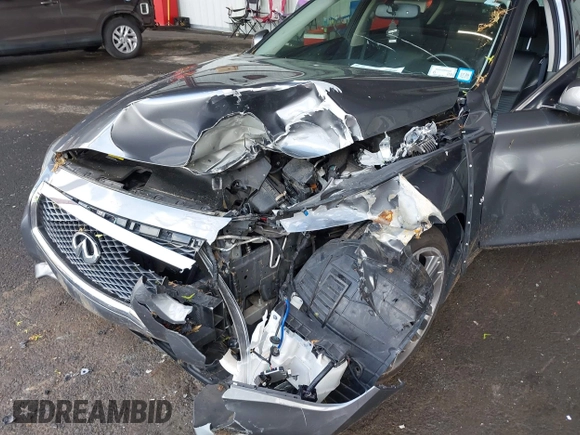 2015 Infiniti Q50 Premium z VIN JN1BV7AR3FM422042, wystawiony jako IAAI lot #42258784 z przebiegiem 72 030 mil mil oraz . Historia ofert i sprzedaży dostępna na DreamBid. Obrazek 6.