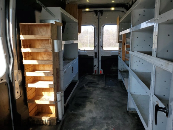 2017 Ford Transit with VIN 1FTYR3XG9HKB12597, listed as a Copart auction lot 52020935 with 281,009 mi miles and Salvage title. Bid and sale history available at DreamBid. Image 10.