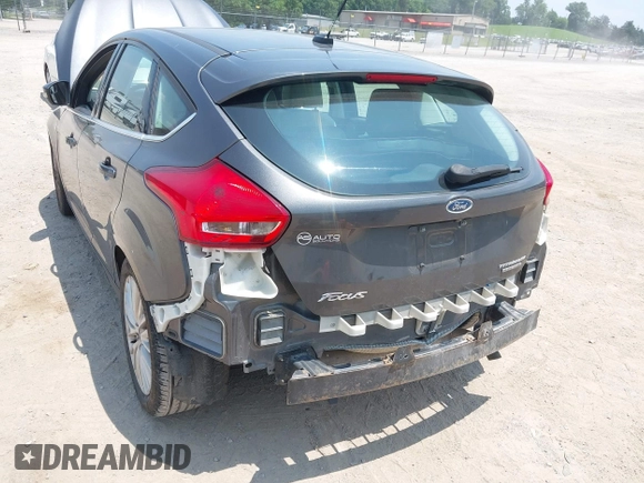 2016 Ford Focus Titanium with VIN 1FADP3N28GL299339, listed as a IAAI auction lot 42410154 with 78,245 mi miles and . Bid and sale history available at DreamBid. Image 6.